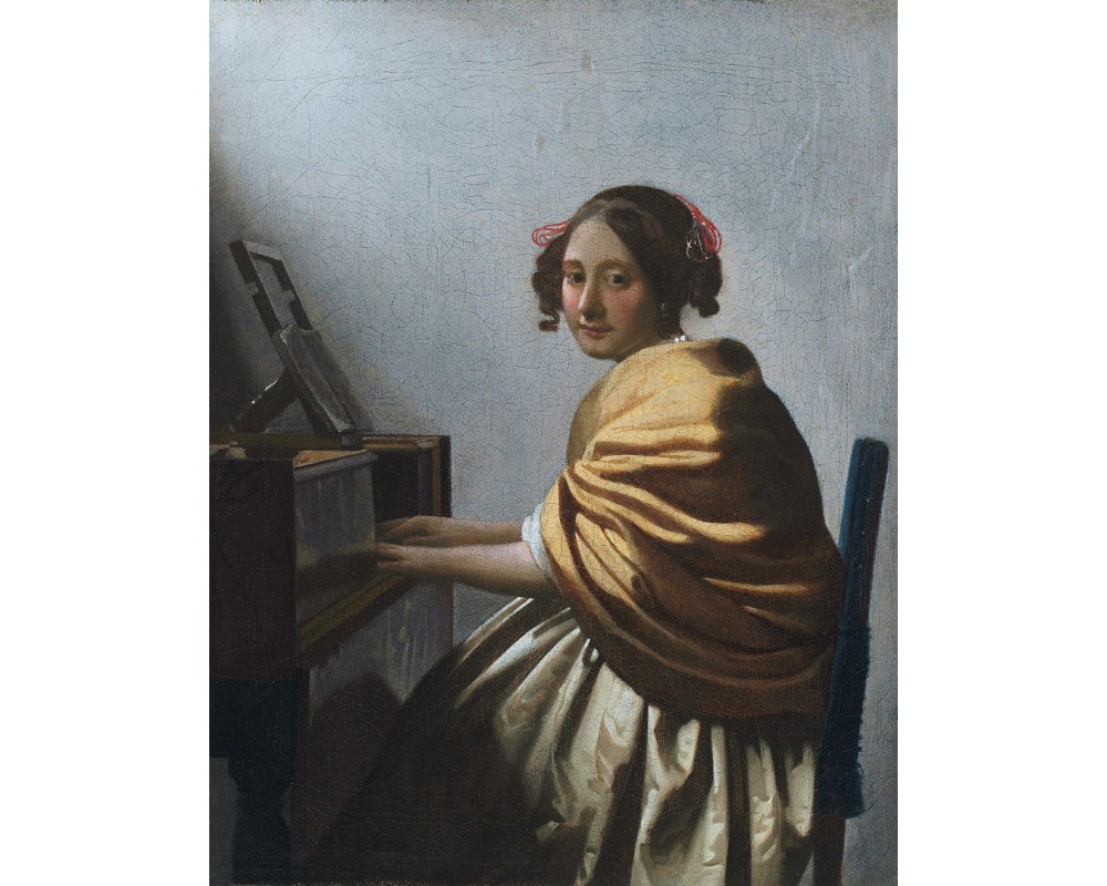 A Young Woman Seated at the Virginals