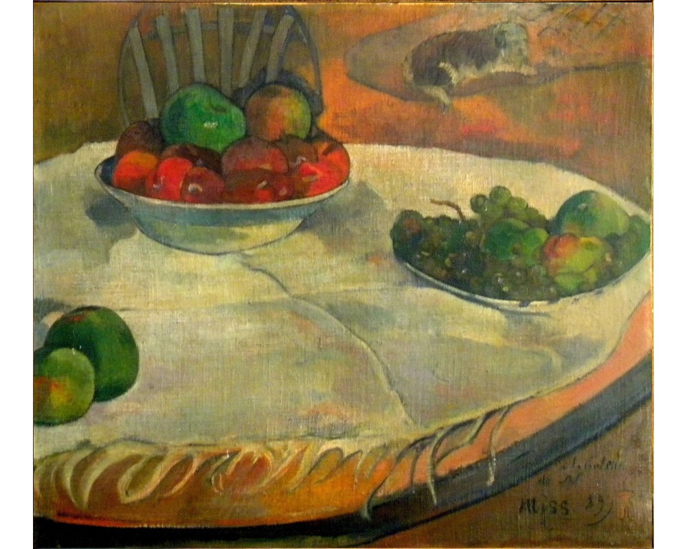 Fruits on a table with a small dog